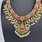 Jadau Kundan Goddess Lakshmi Short Neckline Necklace with Emerald Beads