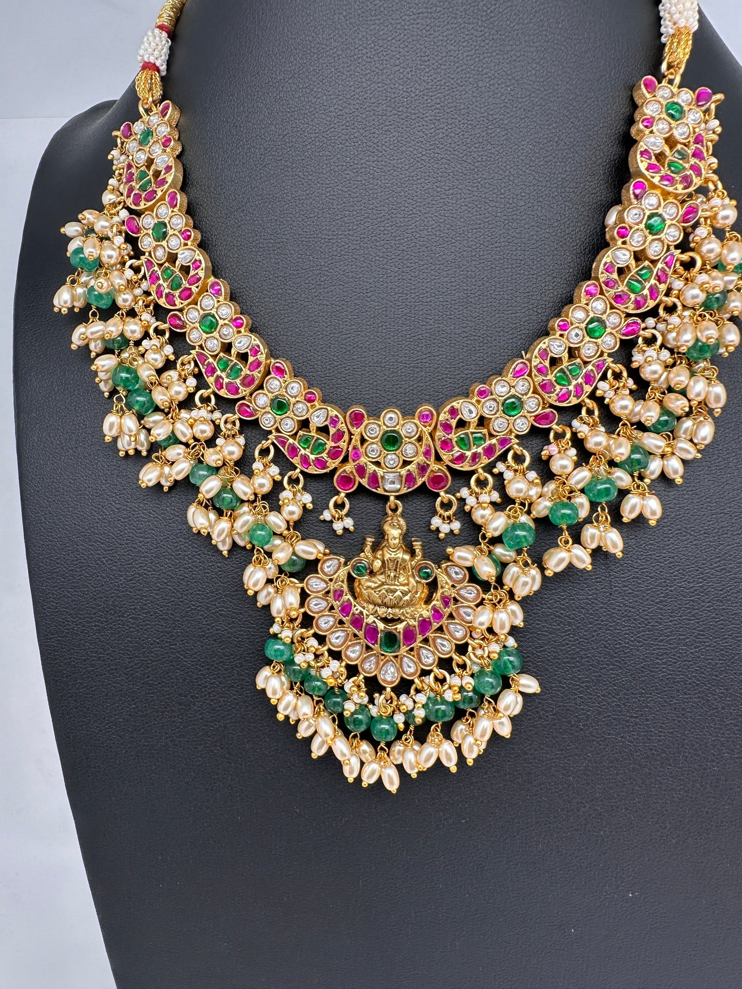 Jadau Kundan Goddess Lakshmi Short Neckline Necklace with Emerald Beads