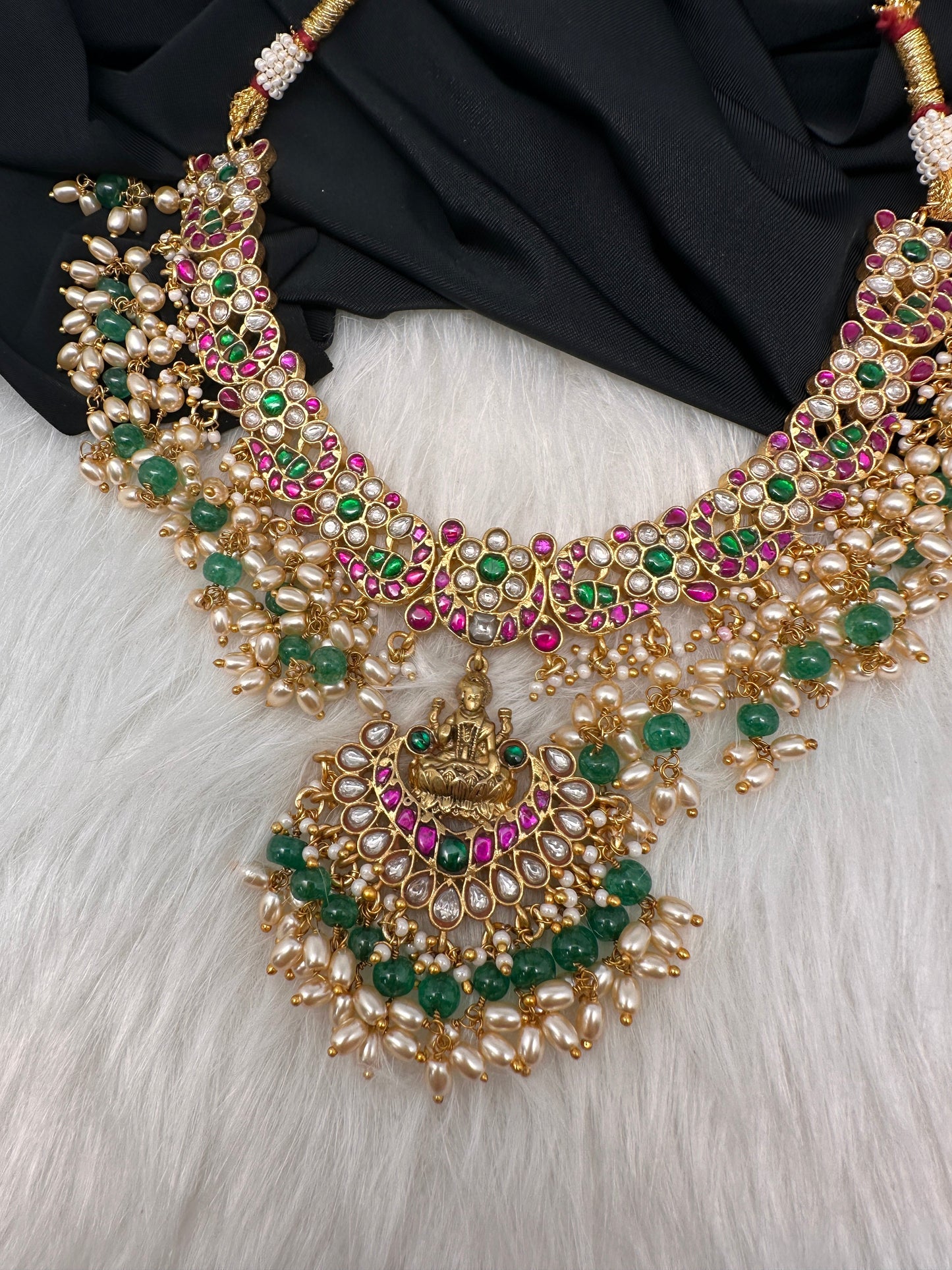 Jadau Kundan Goddess Lakshmi Short Neckline Necklace with Emerald Beads