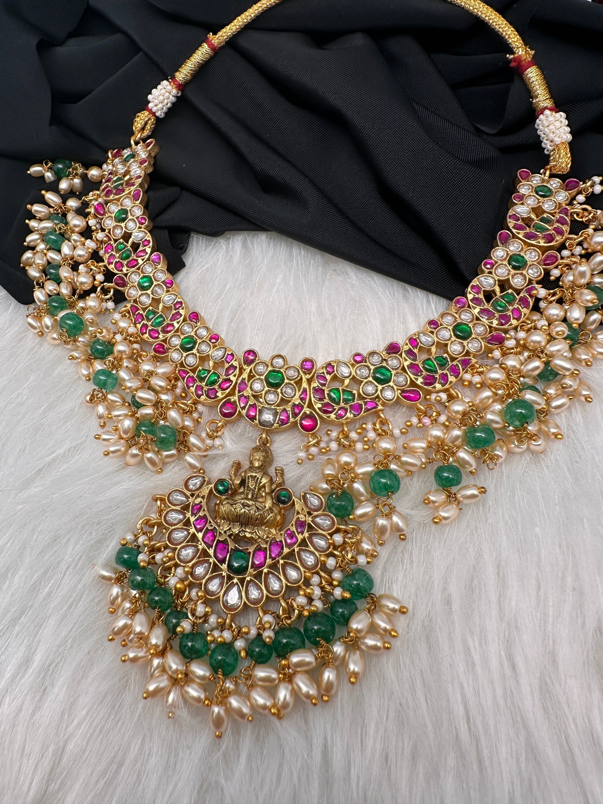 Jadau Kundan Goddess Lakshmi Short Neckline Necklace with Emerald Beads