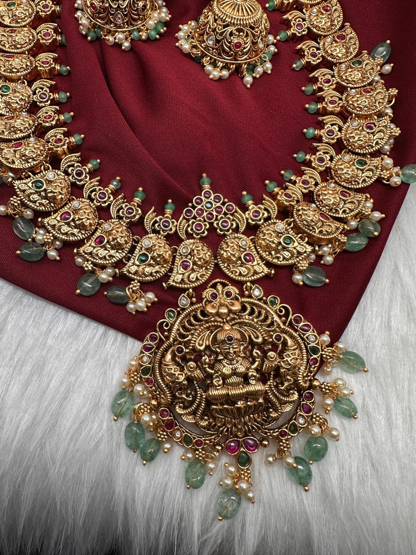 Goddess Lakshmi Ganesha Nakshi Matte Haar with Pearls and Emerald Beads