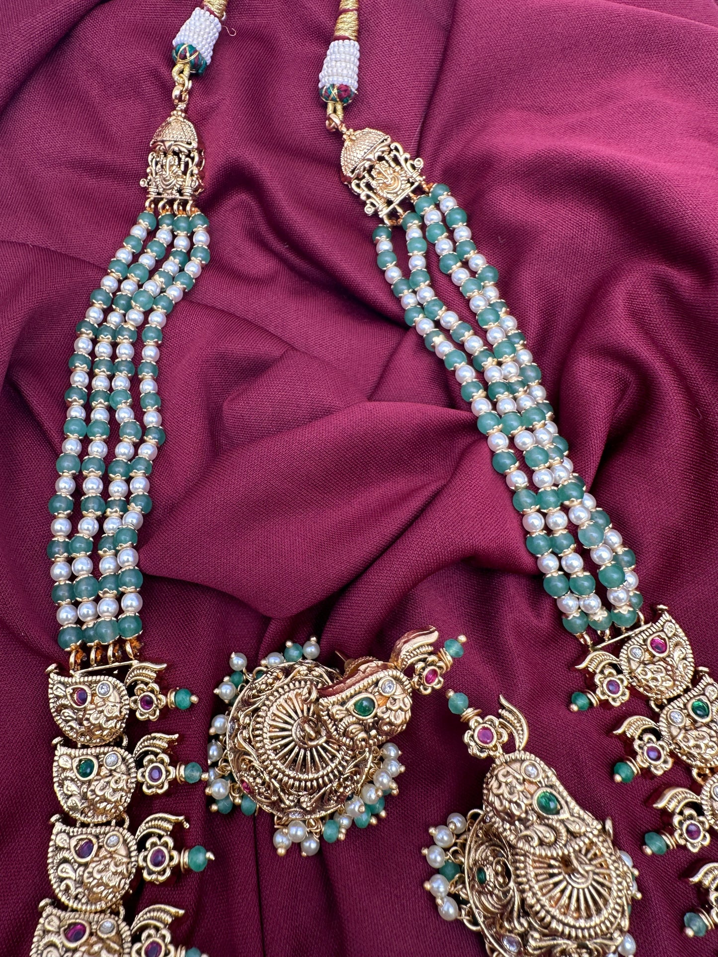 Goddess Lakshmi Ganesha Nakshi Matte Haar with Pearls and Emerald Beads