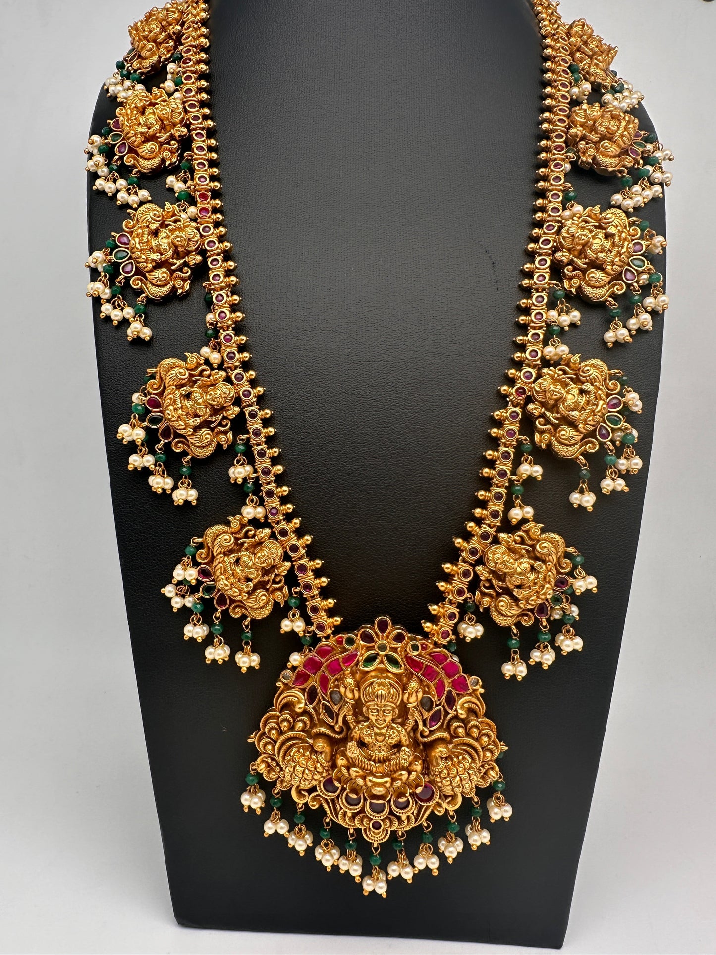 Goddess Lakshmi Jadau Potta Stones Nakshi Matte Haar with Pearls and Green Beads