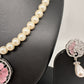 Pink Floral AD Pendent In Silver Finish with Shell Pearl Necklace