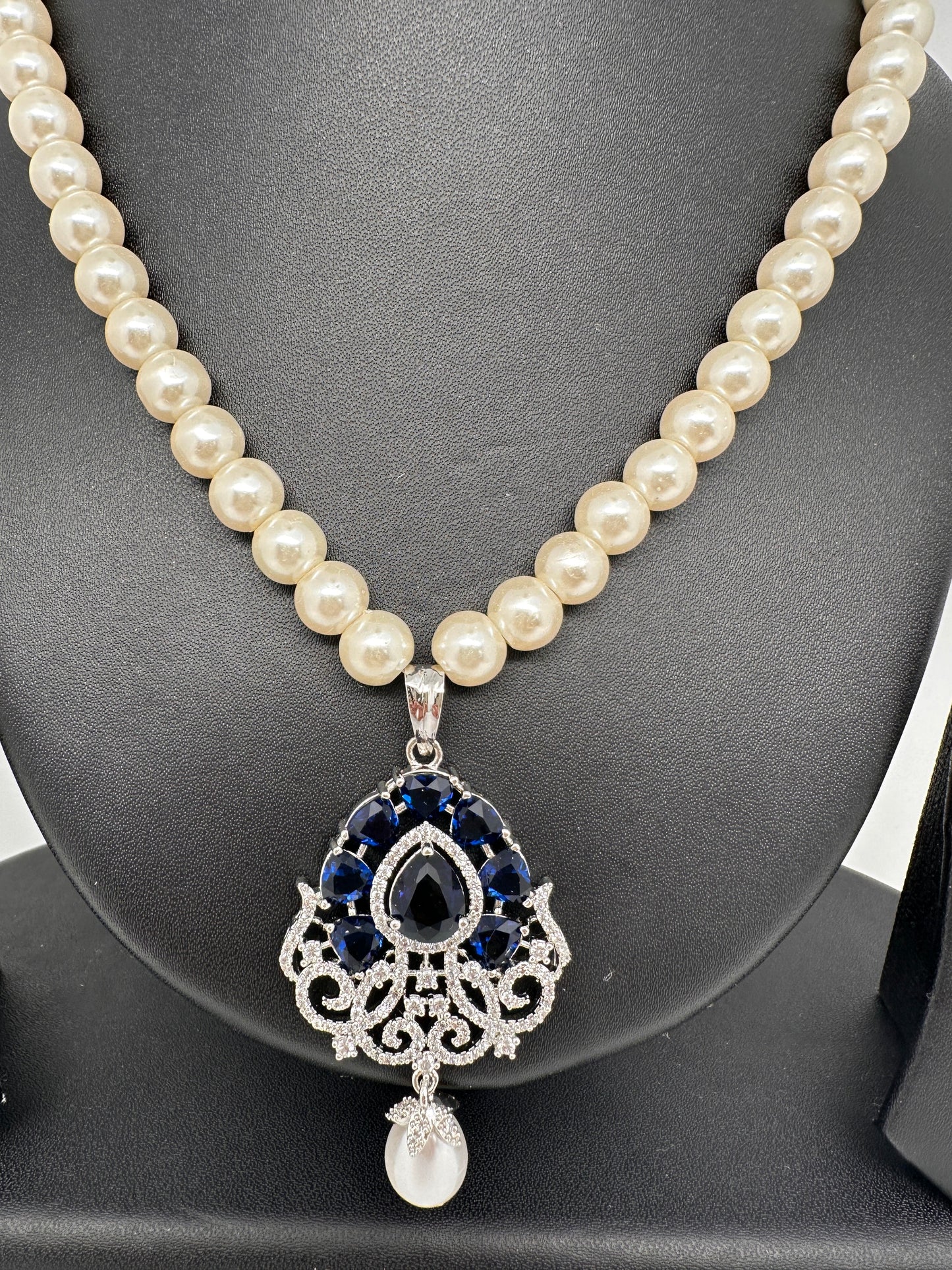 Blue AD Pendent In Silver Finish with Shell Pearl Necklace