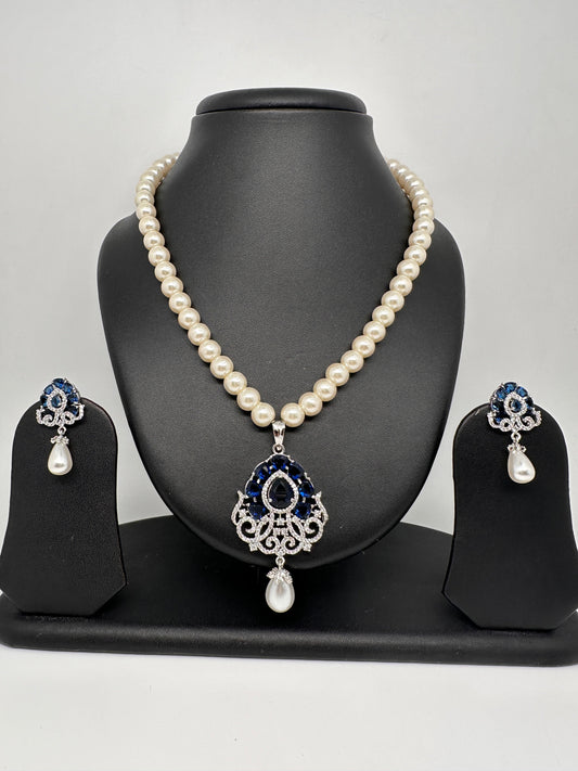 Blue AD Pendent In Silver Finish with Shell Pearl Necklace