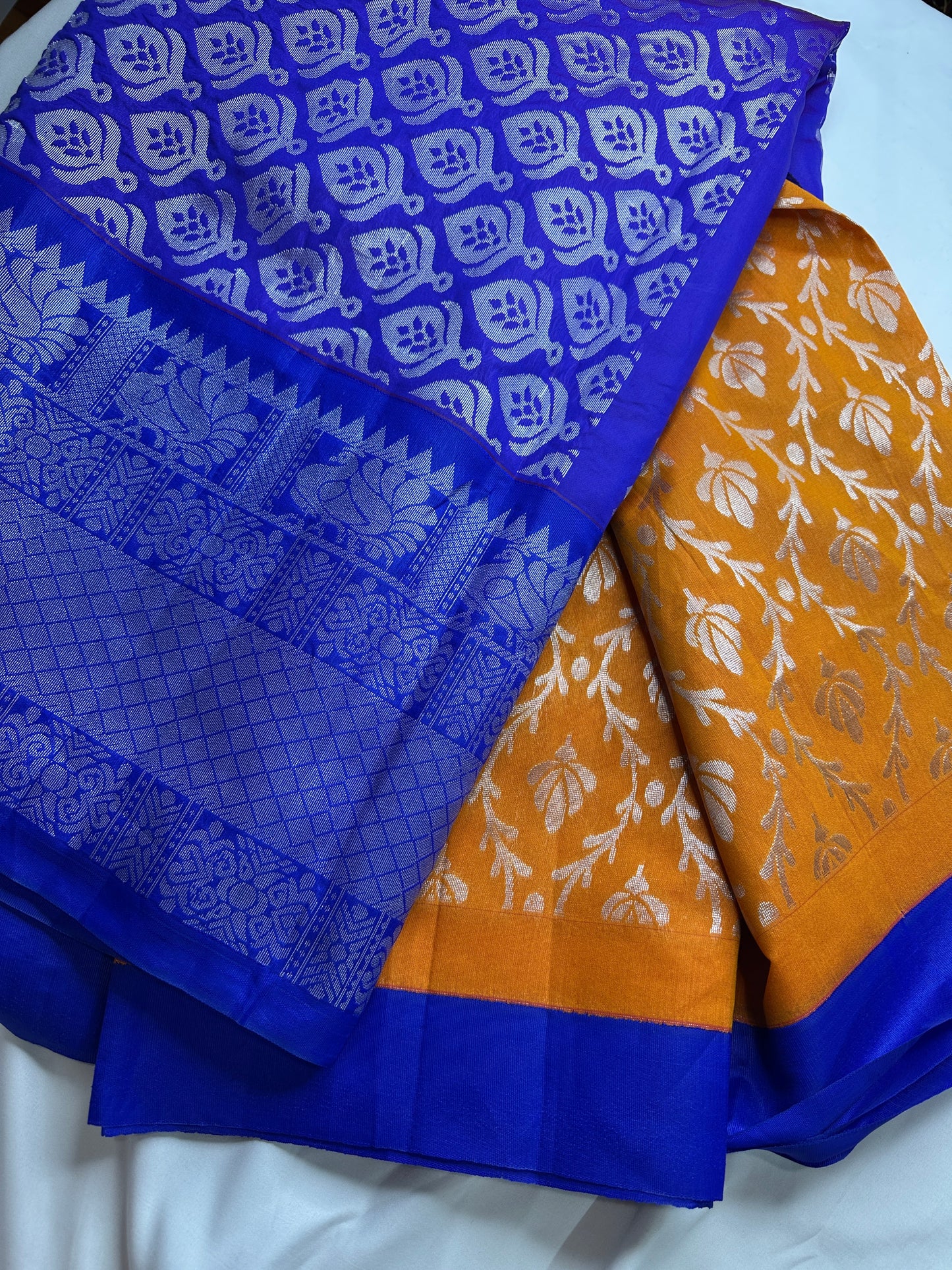 Yellow and Blue Semi Kuppdam Saree