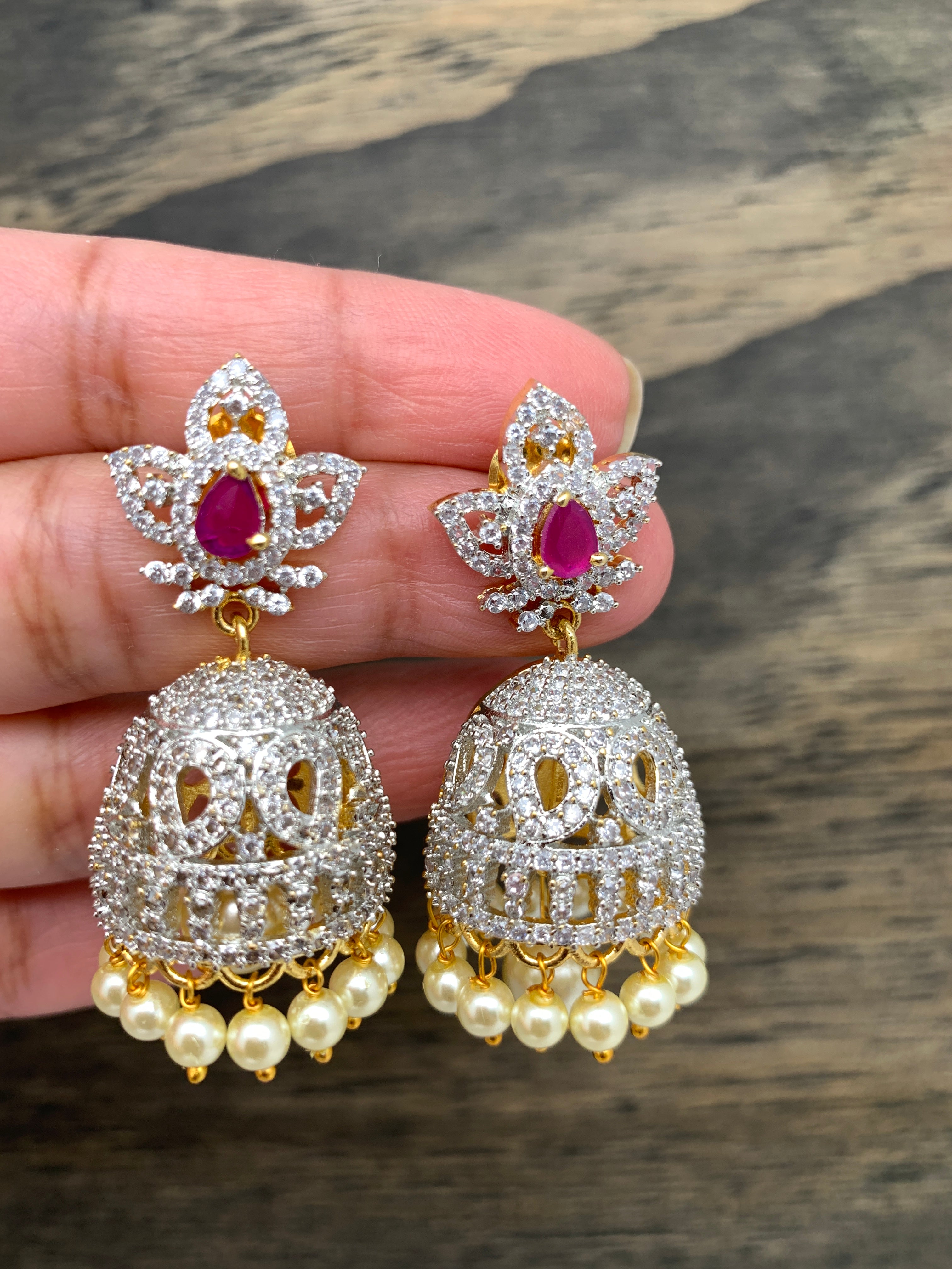 White Stone Studded Gold Color Jhumka Earrings - 80620