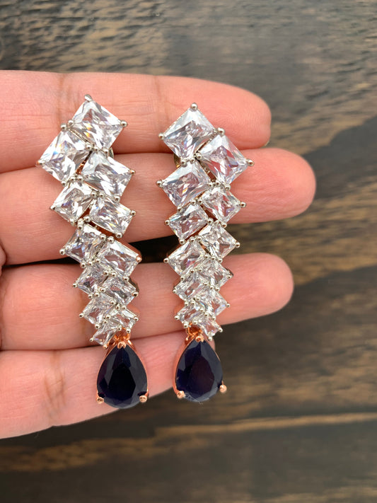 AD Earrings with Blue Stone in Rose Gold Polish