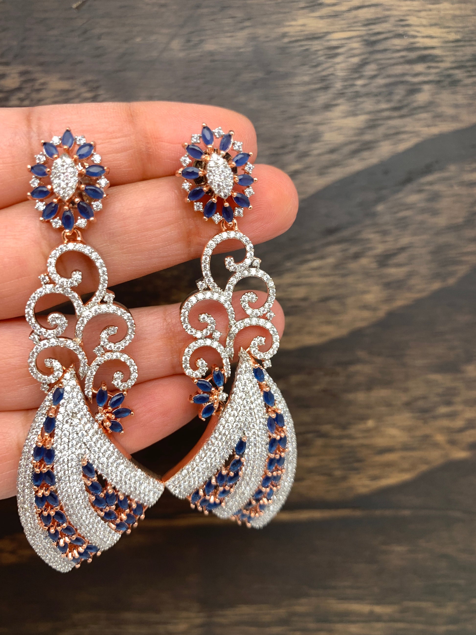 AD and Blue Stone Long Earrings in Rose Gold Polish