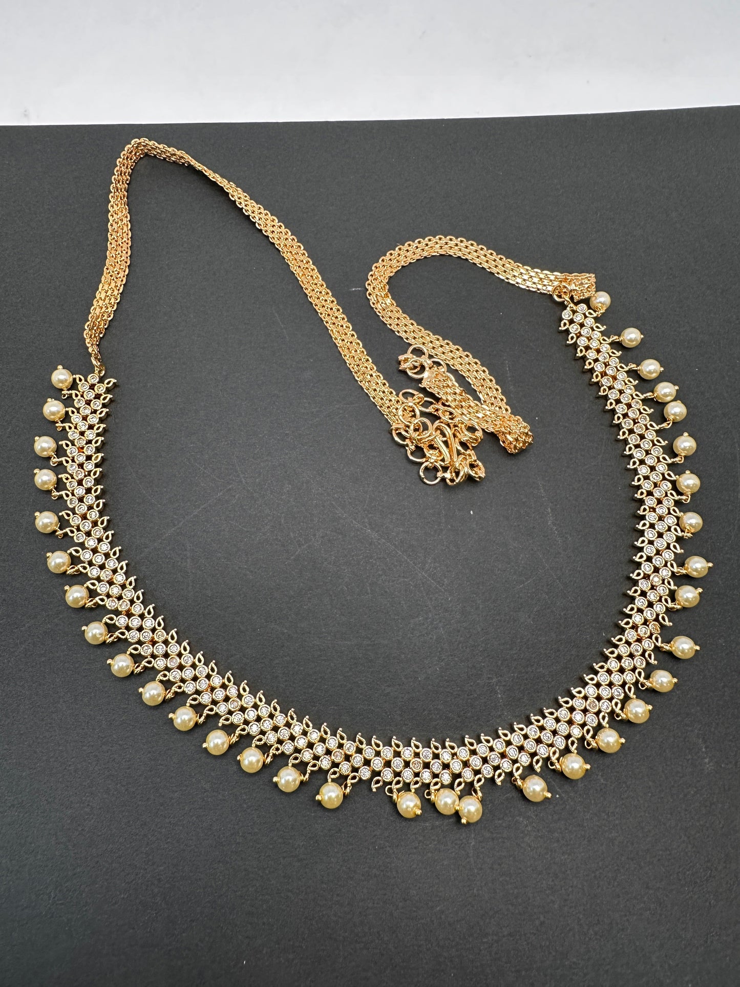 Sleek CZ Pearls Hip Chain Vaddanam