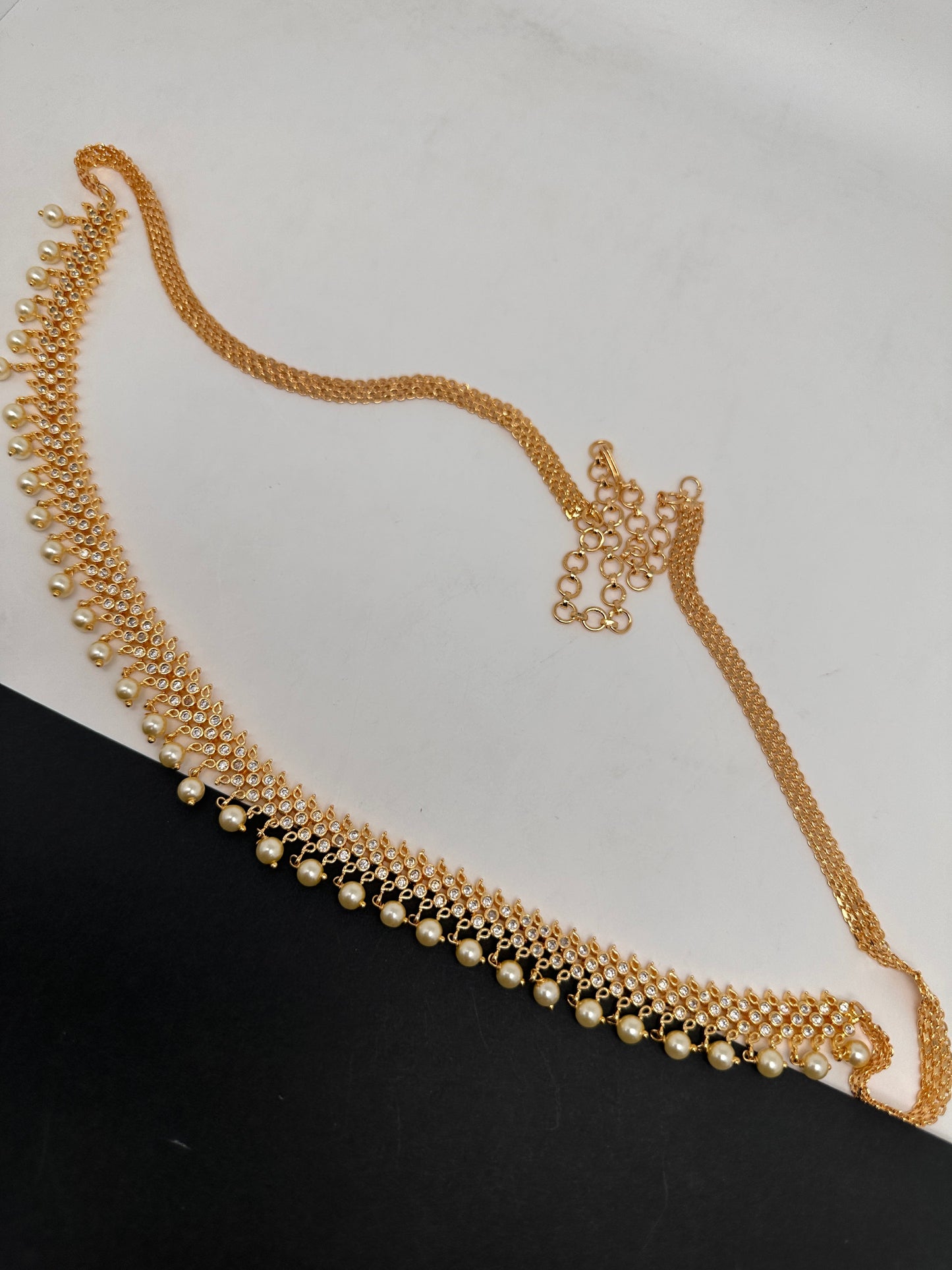 Sleek CZ Pearls Hip Chain Vaddanam