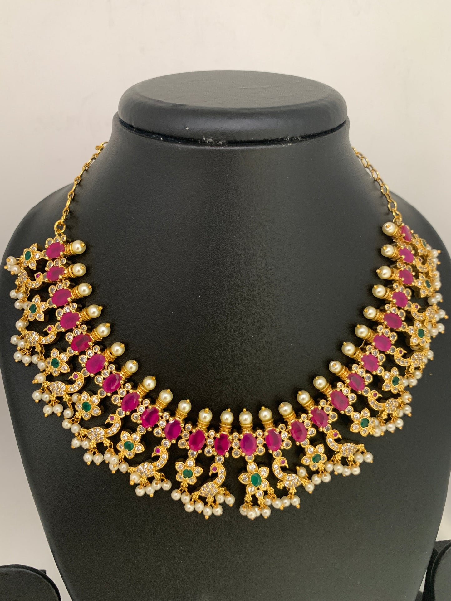 AD Red Stone Floral Peacock Design Golden Finish Neckline Necklace