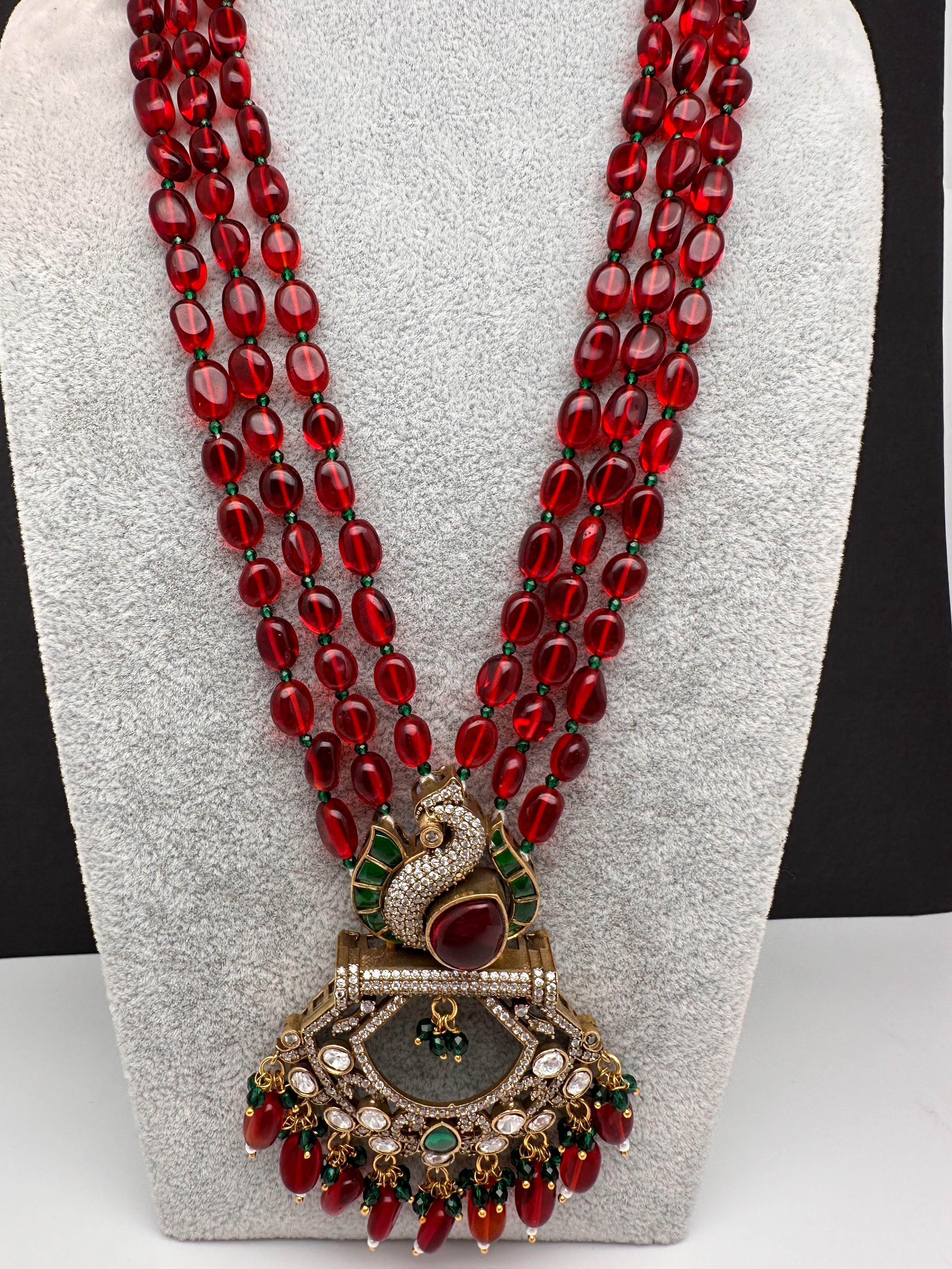 Gorgeous Mogul Carnelian Red Green glass beads with blue enamel &Rhinestone Peacock Birds outlets set in Exotic Goldtone Statement Tasseled Necklace